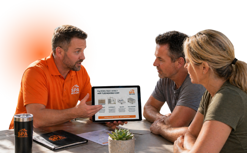 Homeowners observing hot tub relocation process from deck area