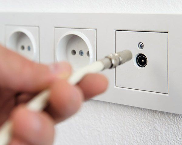 A White Cable Being Plugged — Sonic Digital In West Gosford, NSW