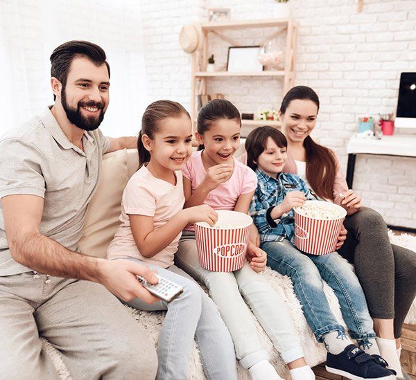A Happy Family Watching A TV — Sonic Digital In West Gosford, NSW