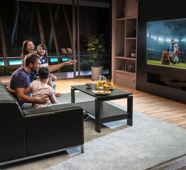 Family Watching Sport — Home Theatre In West Gosford, NSW