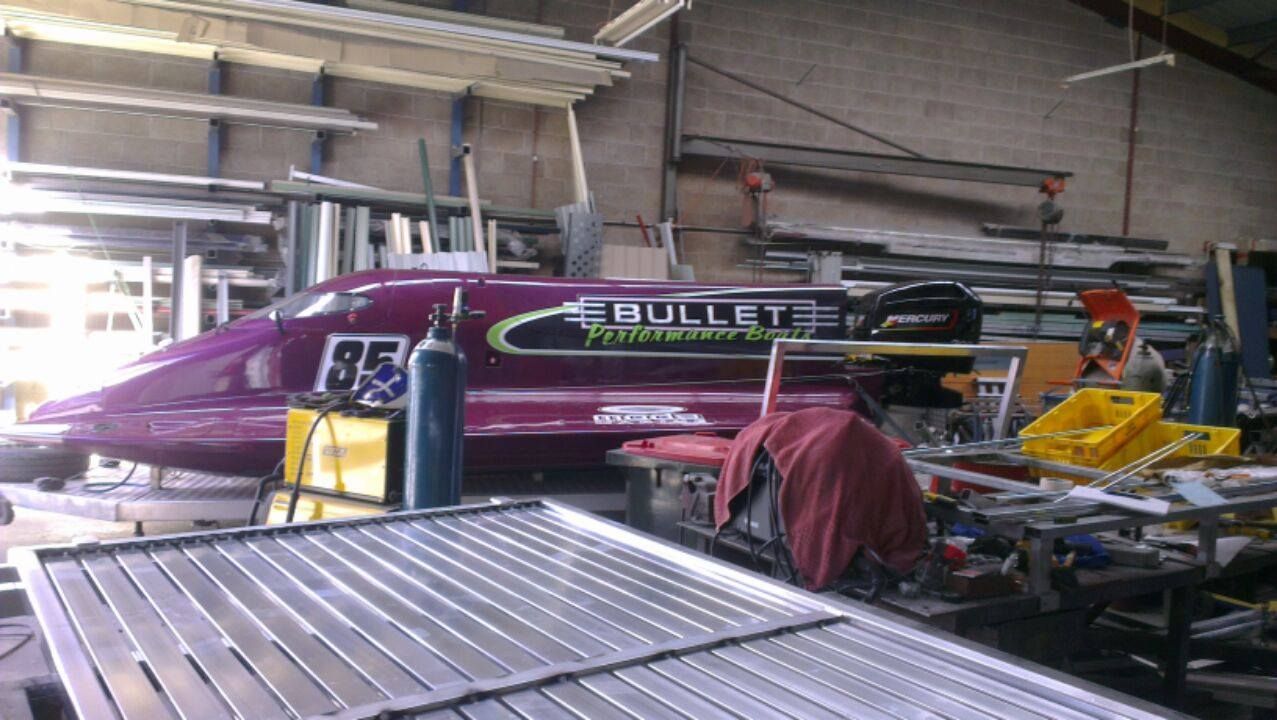 A Purple Vehicle With The Number 85 On It — Boambee Home Improvements in Bellingen, NSW