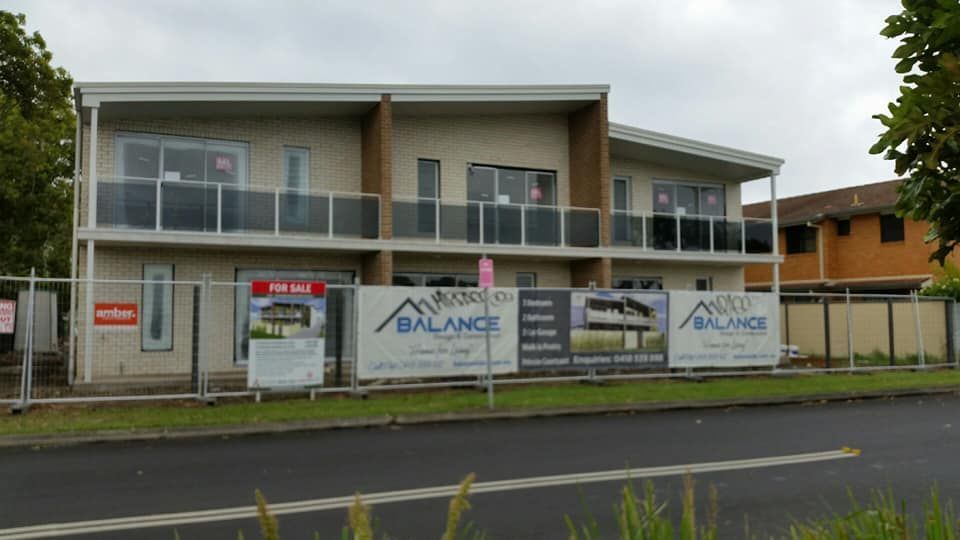 A Building Under Construction With A Sign That Says Balance On It — Boambee Home Improvements in Macksville, NSW