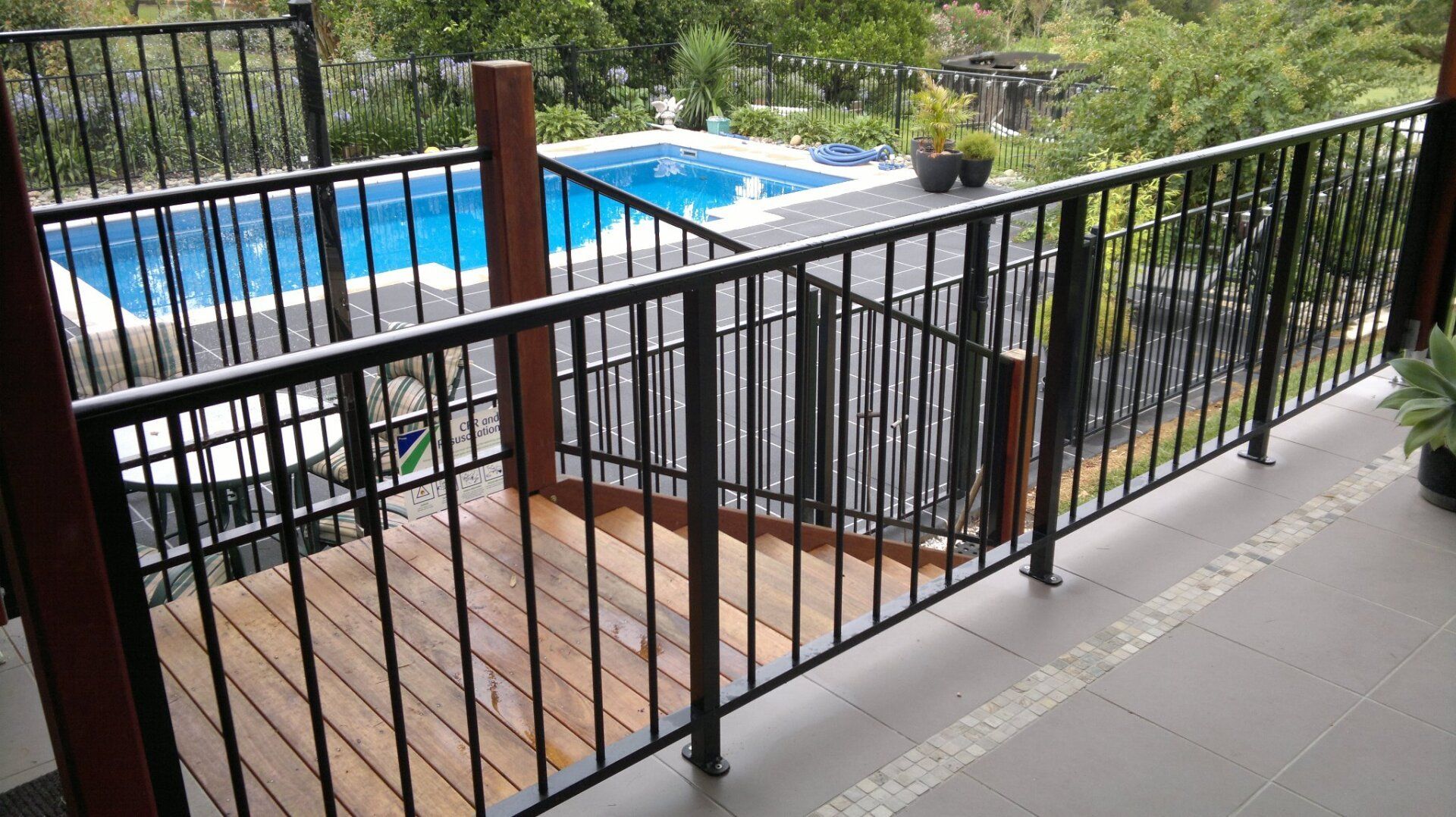 Black Metal Pool Fence — Boambee Home Improvements in Coffs Harbour, NSW