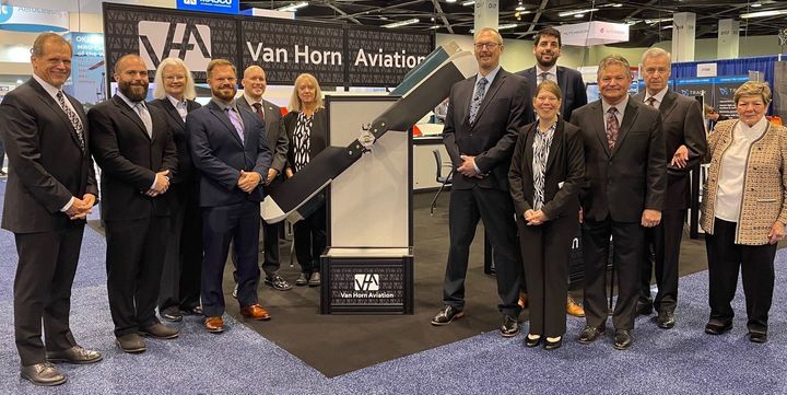 Group photo at VHA Heli-Expo 2024 booth