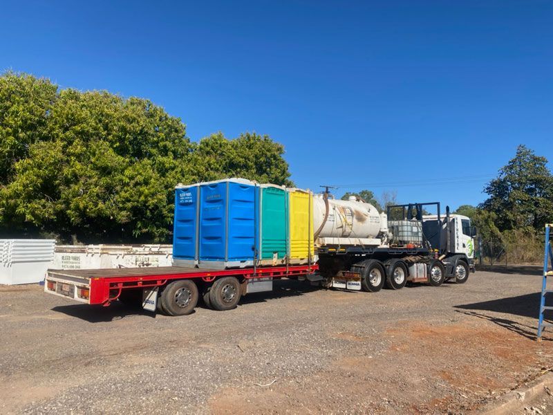 Truck loaded with portable toilets — Waste Management in Katherine, NT