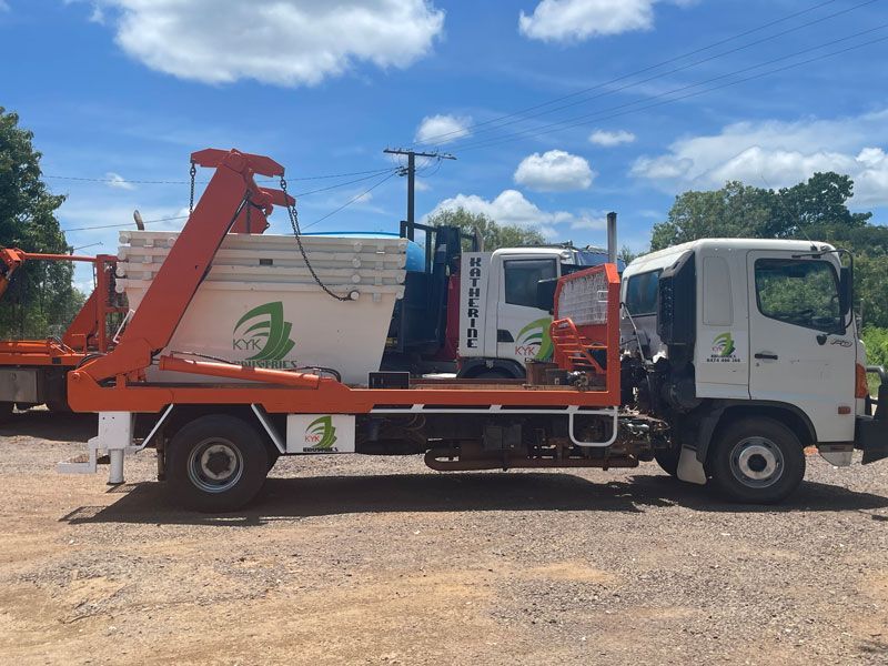 Truck loaded with Skip Bin — Waste Management in Katherine, NT