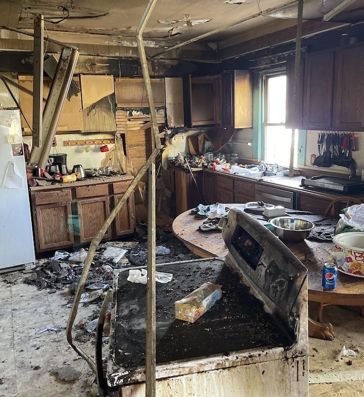 A kitchen with a pepsi can on the counter