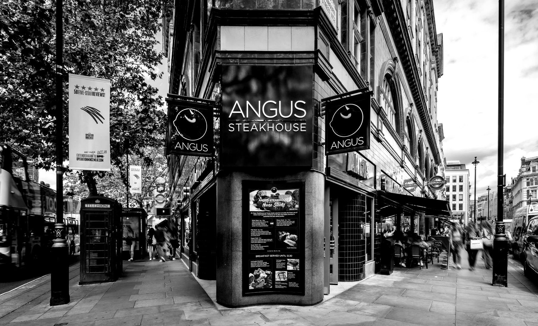 A black and white photo of an angus steakhouse