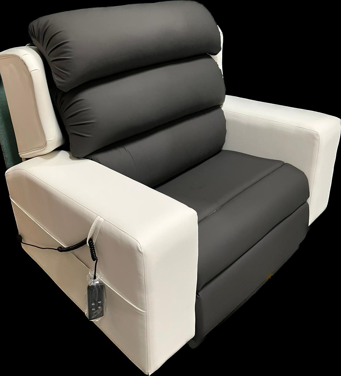 A black and white chair with a remote control on it