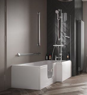 A bathroom with a bathtub and a shower stall.