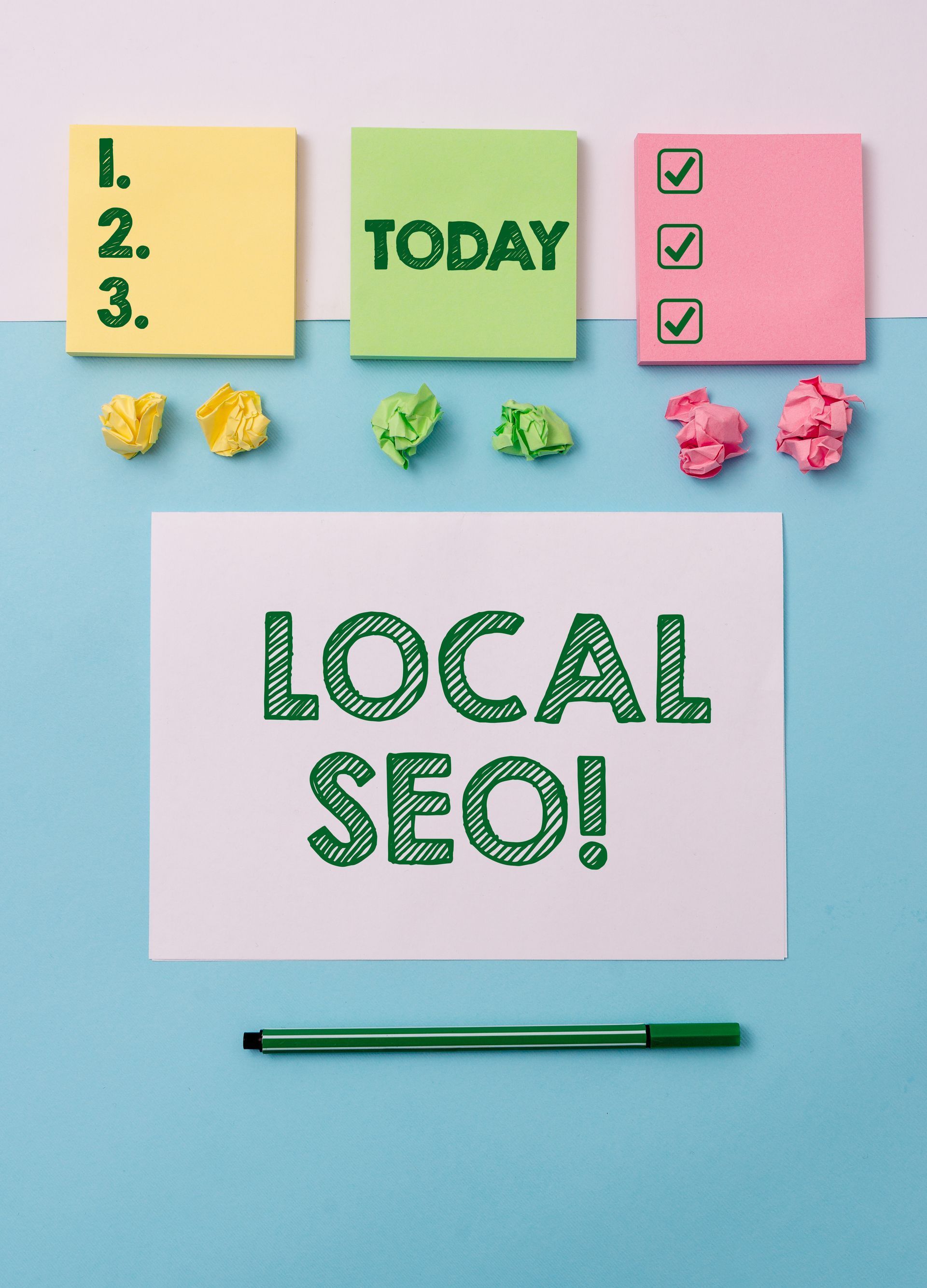 White paper with “LOCAL SEO!” and colorful sticky notes: “Today,” checklist, and numbered list, on a blue background.