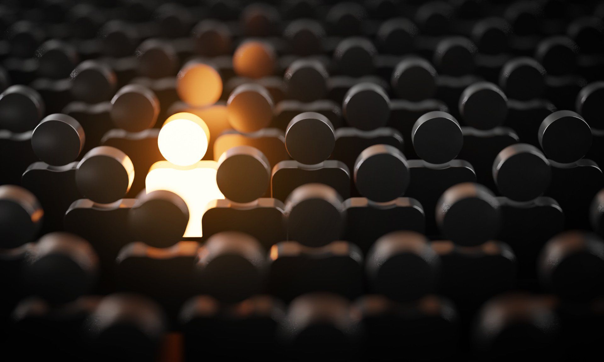 Lit-up person stands out from a crowd of dark figures, symbolizing uniqueness and visibility.