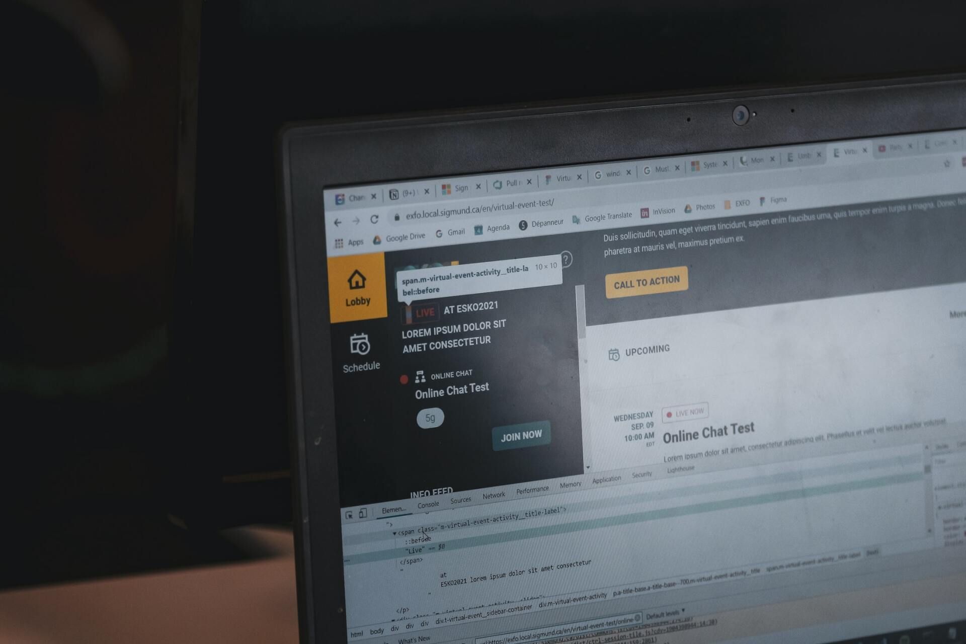 Laptop screen displaying a webpage with a search bar and results, indoors.