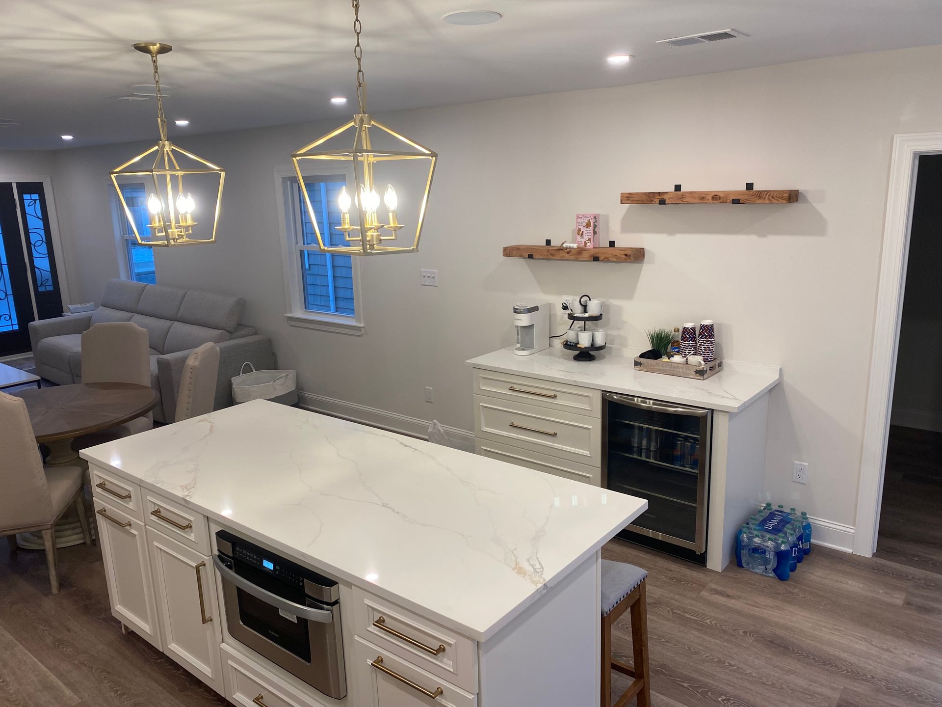 There is a large island in the middle of the kitchen.