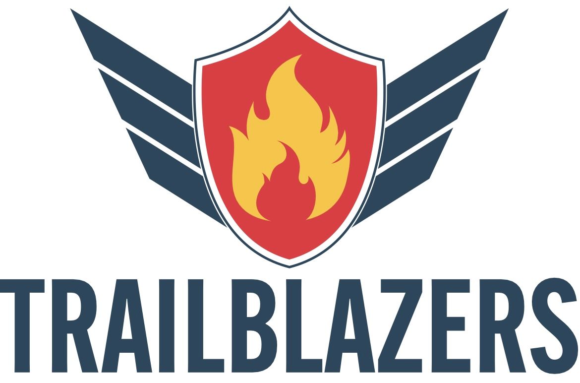 Logo for Trailblazers Track Club: red shield with flame, flanked by blue wings, above dark blue text.
