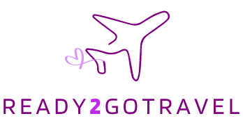 The logo for ready2gotravel is a purple airplane with a heart on it.