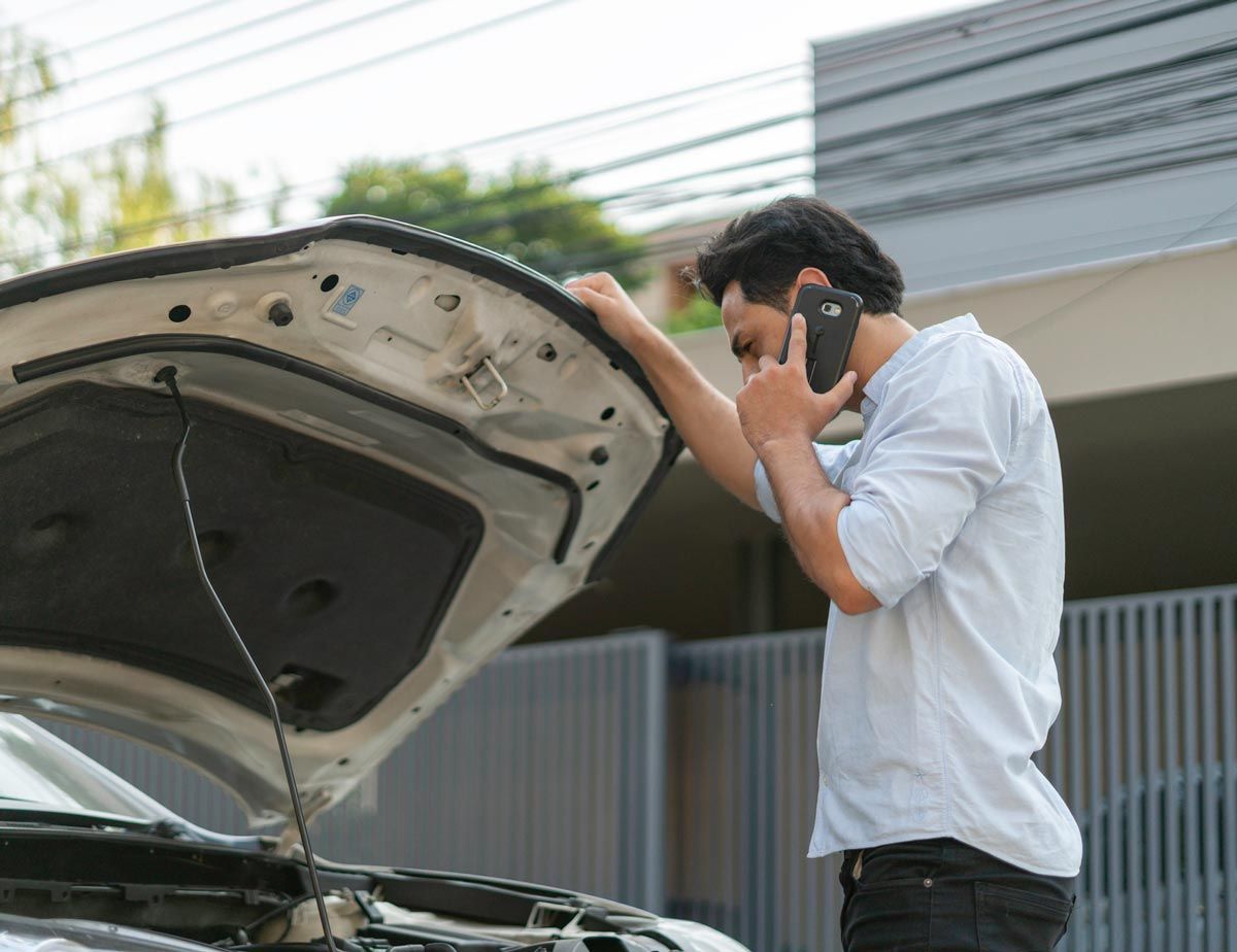 Man Having A Car Issue — Honolulu, HI — Saigon Towing