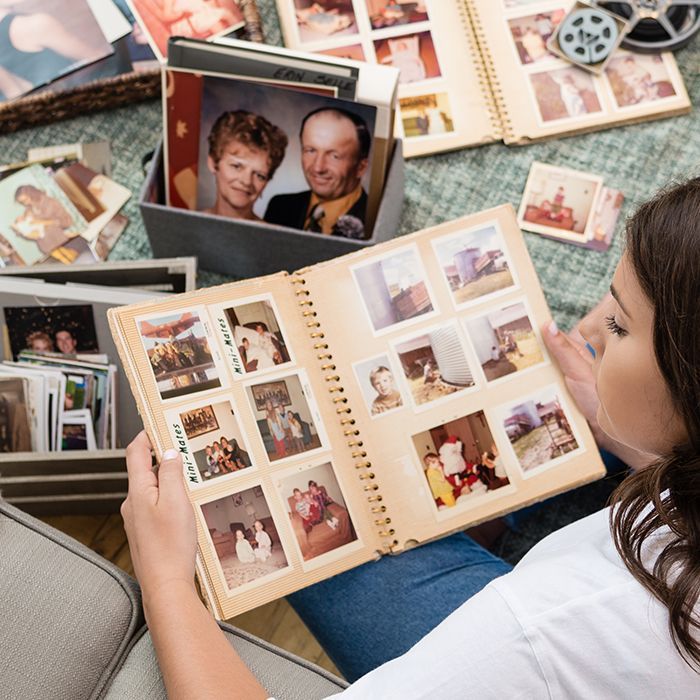Slide viewer with old slides and a framed portrait - photo scanning and digitizing services at Fort Worth Camera 
