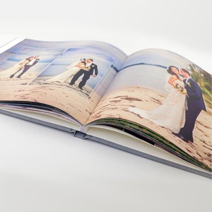 a photo book on a white desk