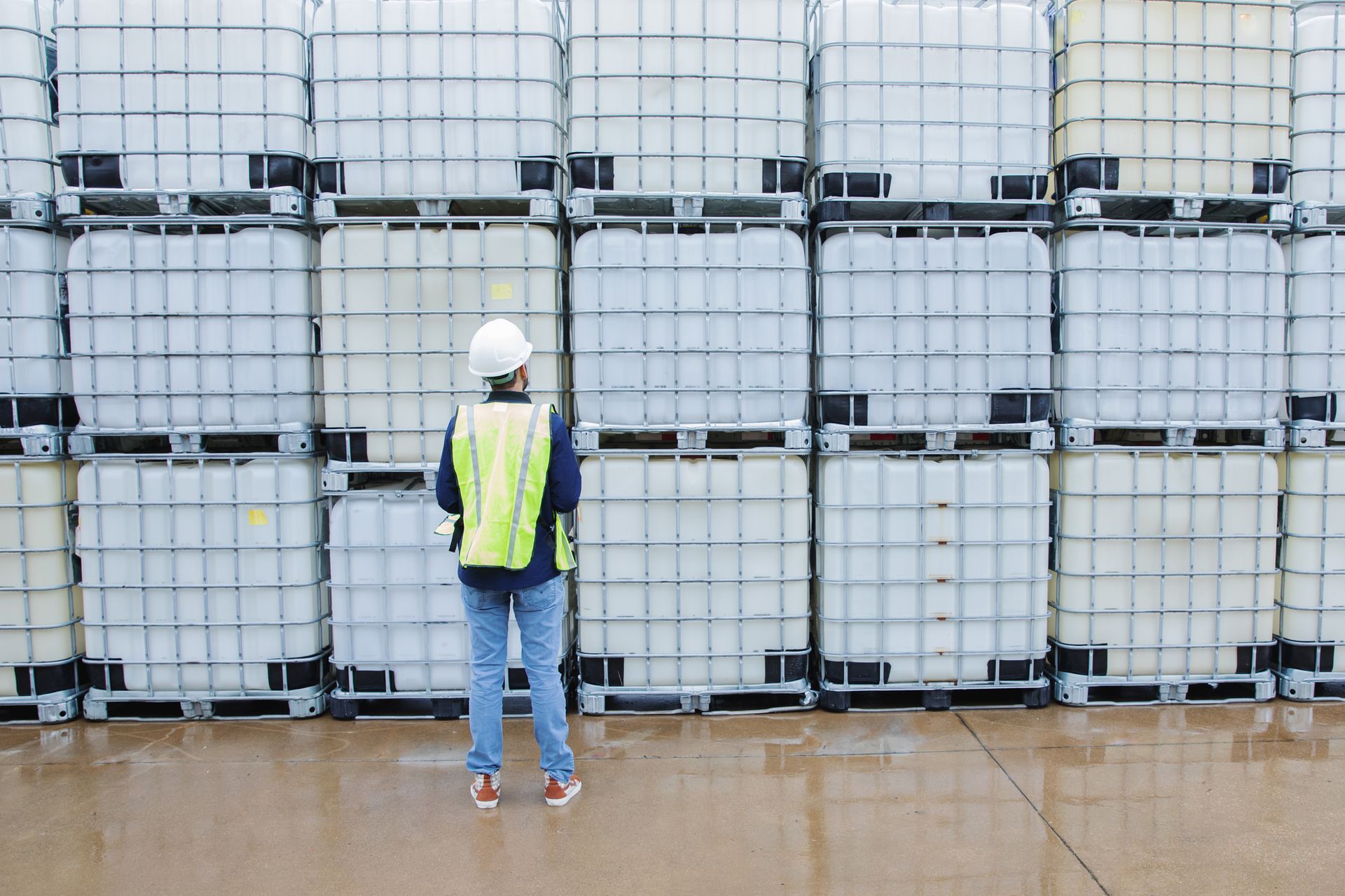 Engineer Checks Inventory of Chemical Crates — Jacksonville, FL — Paul Murray Oil Inc