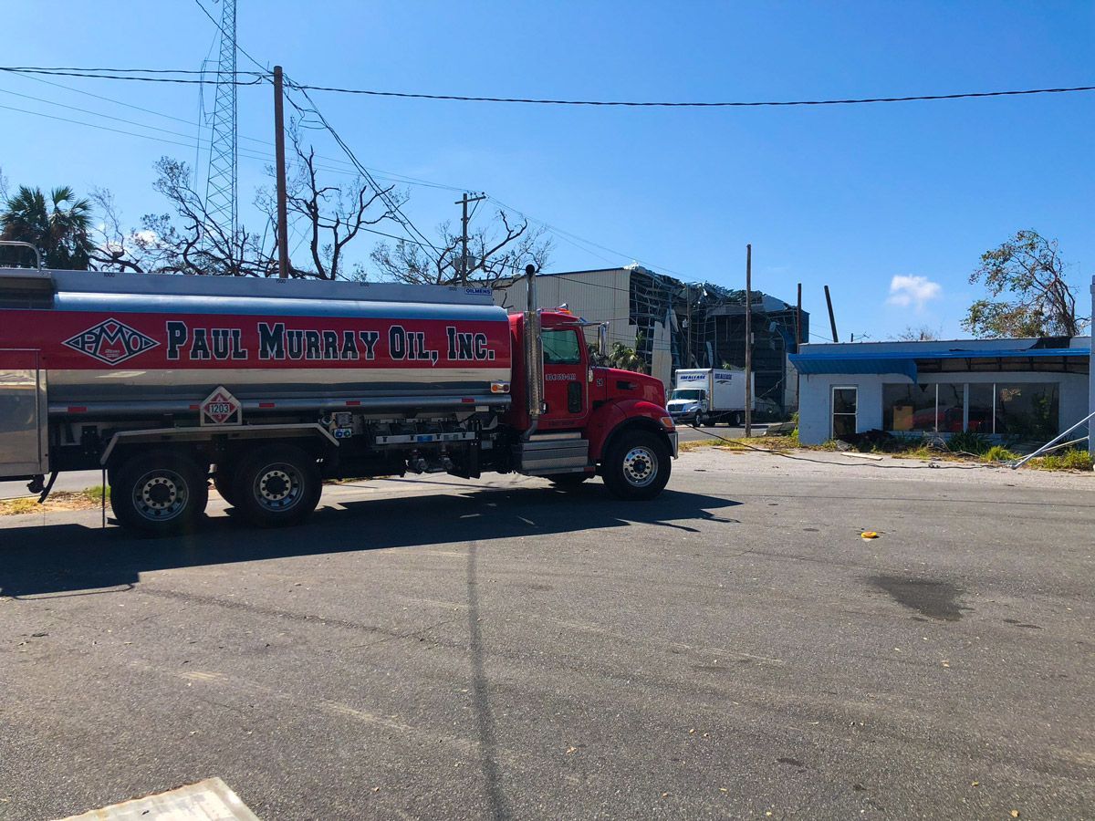 Red and Silver Tanker Truck on the Road — Jacksonville, FL — Paul Murray Oil Inc