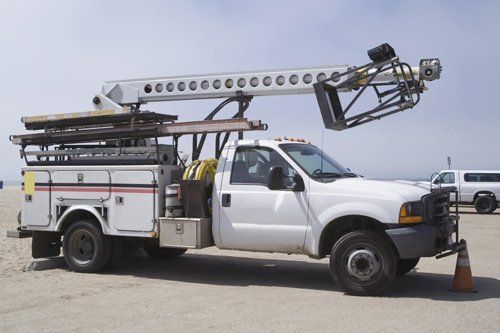 Utility Truck in Parking Lot — Jacksonville, FL — Paul Murray Oil Inc