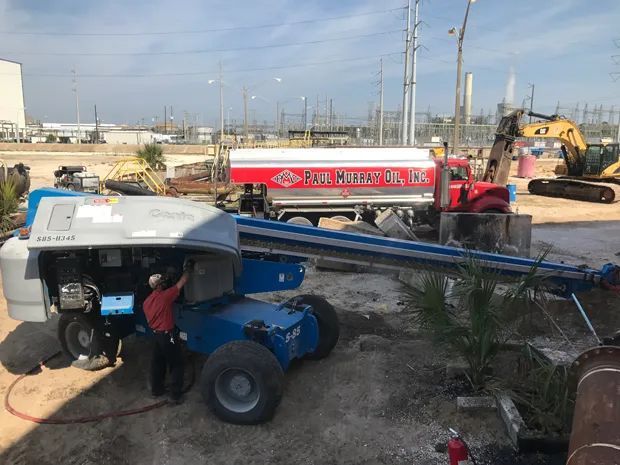 Man Working on a Truck Machine — Jacksonville, FL — Paul Murray Oil Inc