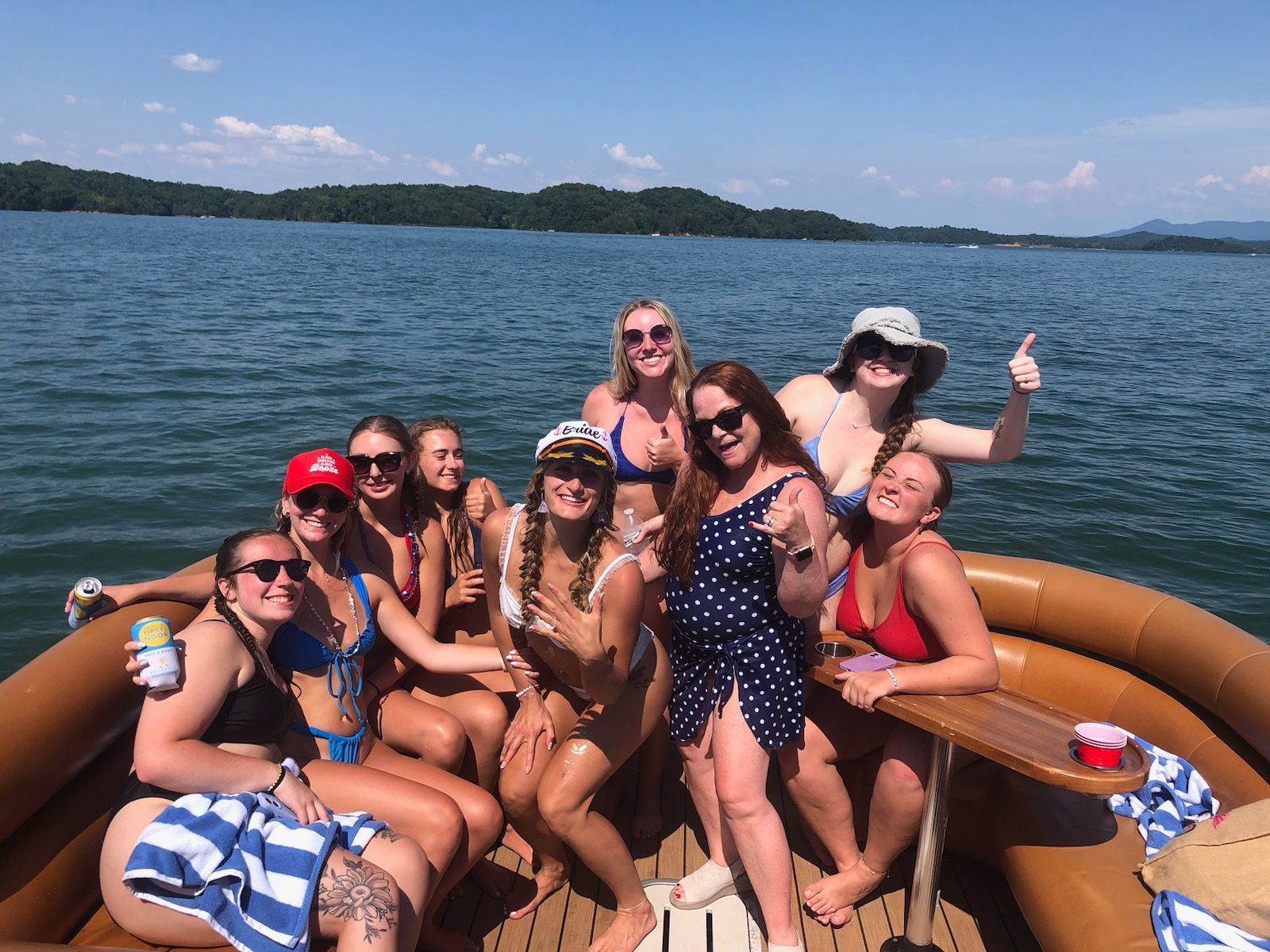 A view of a lush green forest in the mountains on a cloudy day.