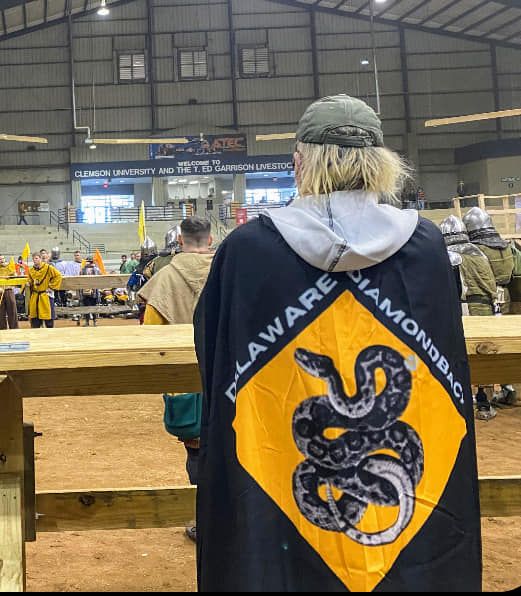 A Person Wearing a Cape - DE - Diamond State Steel Academy