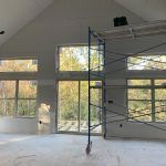 A Mid-Missouri Living Room With Many Windows Built by Watts Construction