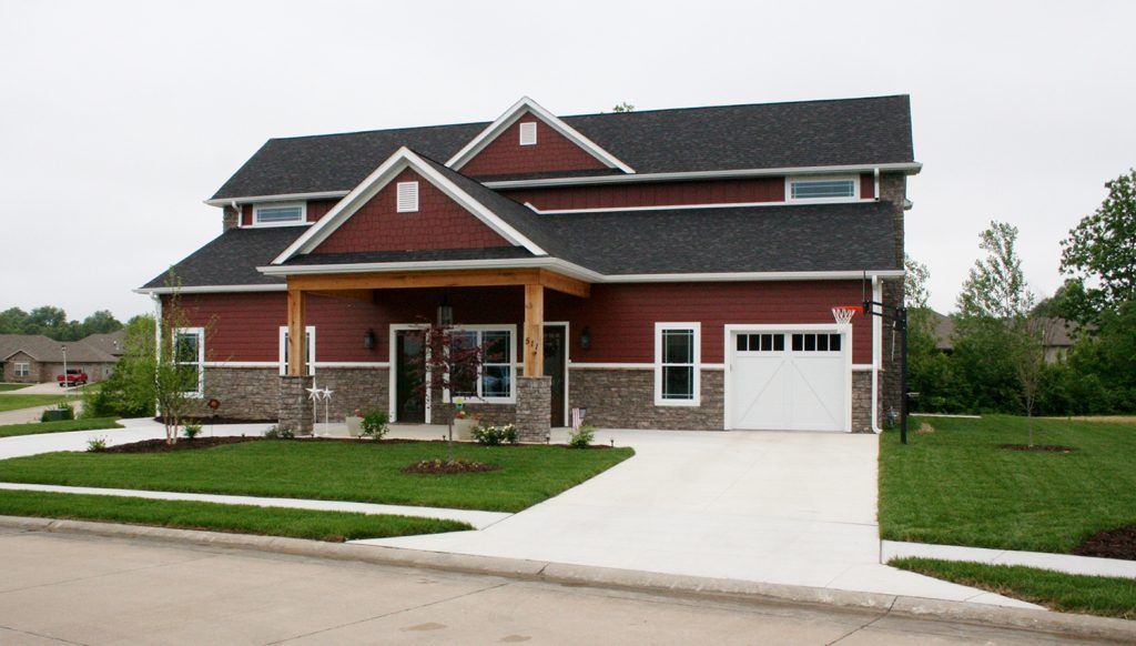 A Beautiful Red Mid-MO Custom Home by Watts Construction in Ashland, MO