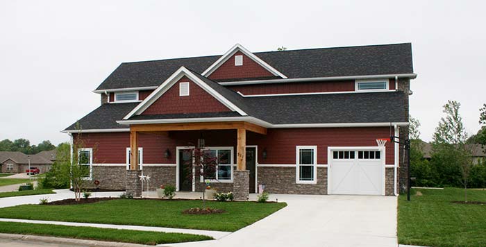 A Stunning Red Mid-Missouri Custom Home by Watts Construction in Ashland, MO