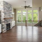 An Upstairs Living Space by Watts Construction in Mid-Missouri With a Fireplace