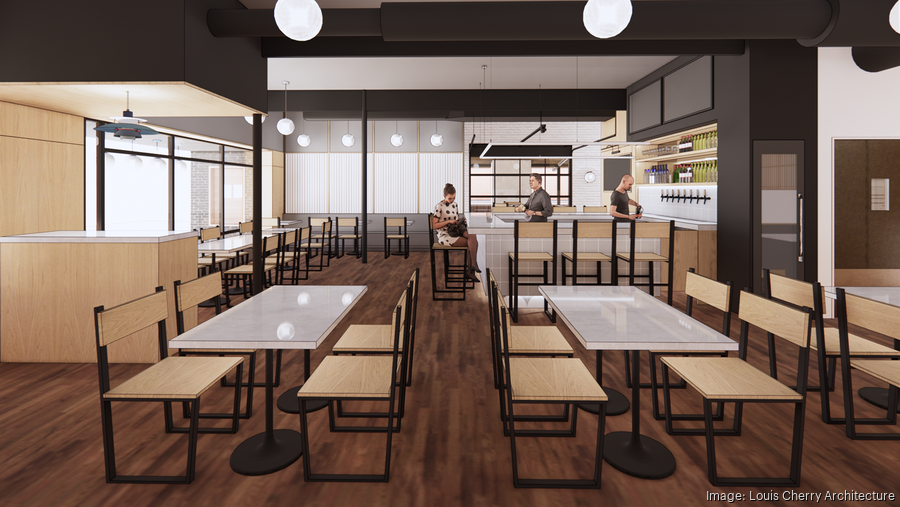 Restaurant interior: tables with chairs, bar with stools, patrons seated and standing.