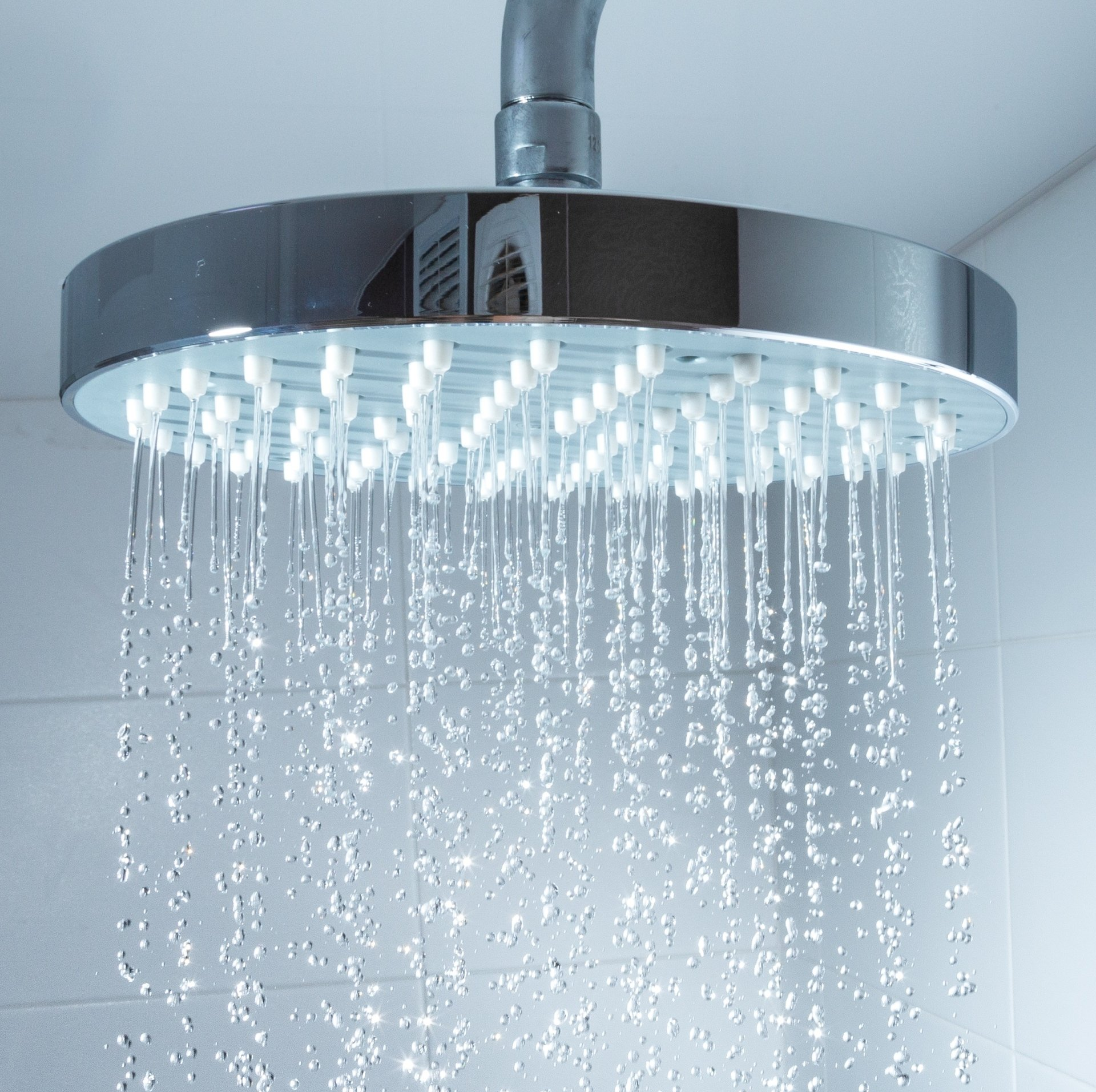 shower head with water running