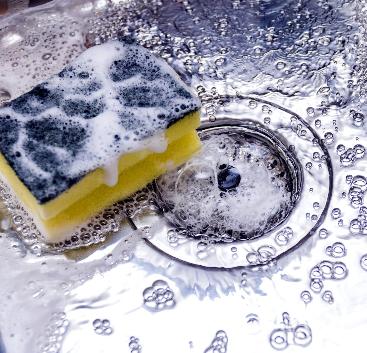 sink with sponge and bubbles