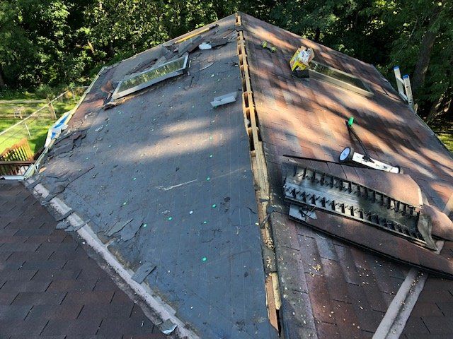 Repairs — Damaged Residential Roofing Being Repaired in Cranberry Township, PA