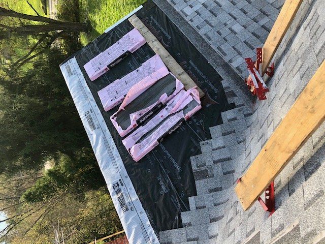 Roofers — Installing New EPDM