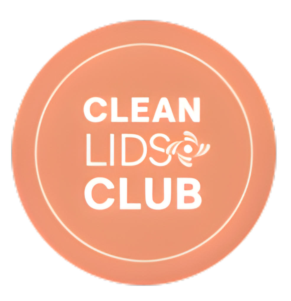 A circular peach-colored logo with white text reading 