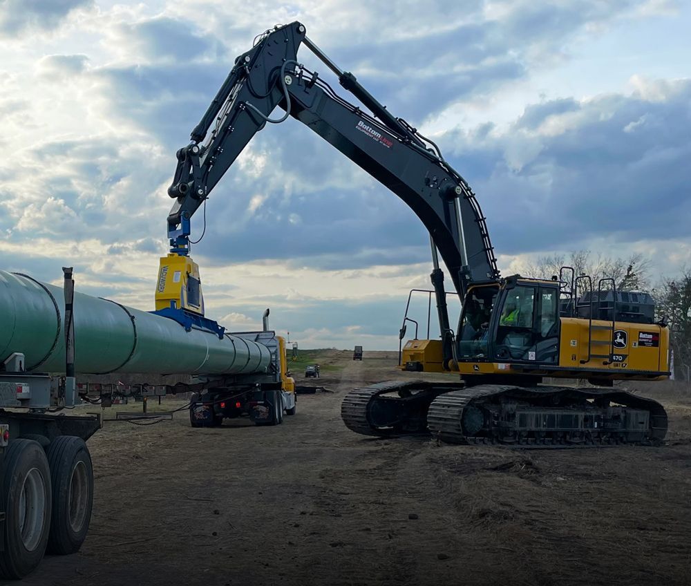 Heavy equipment moving pipelines