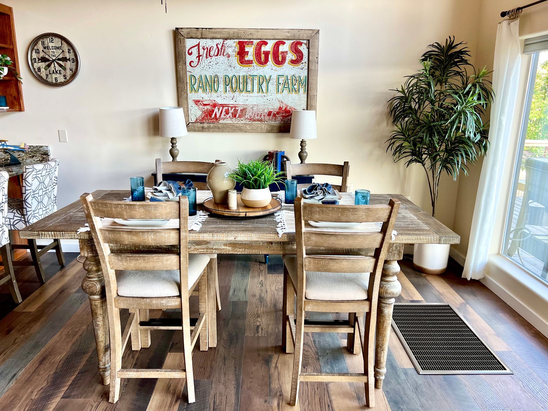 Rustic dining room with farm style table and chairs.