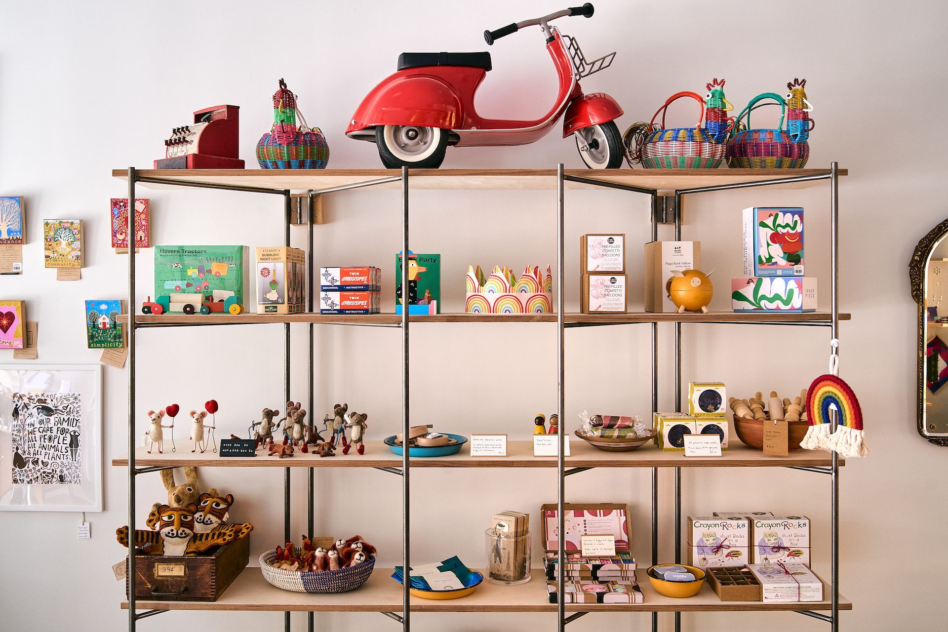 A shelf with a red scooter on top of it