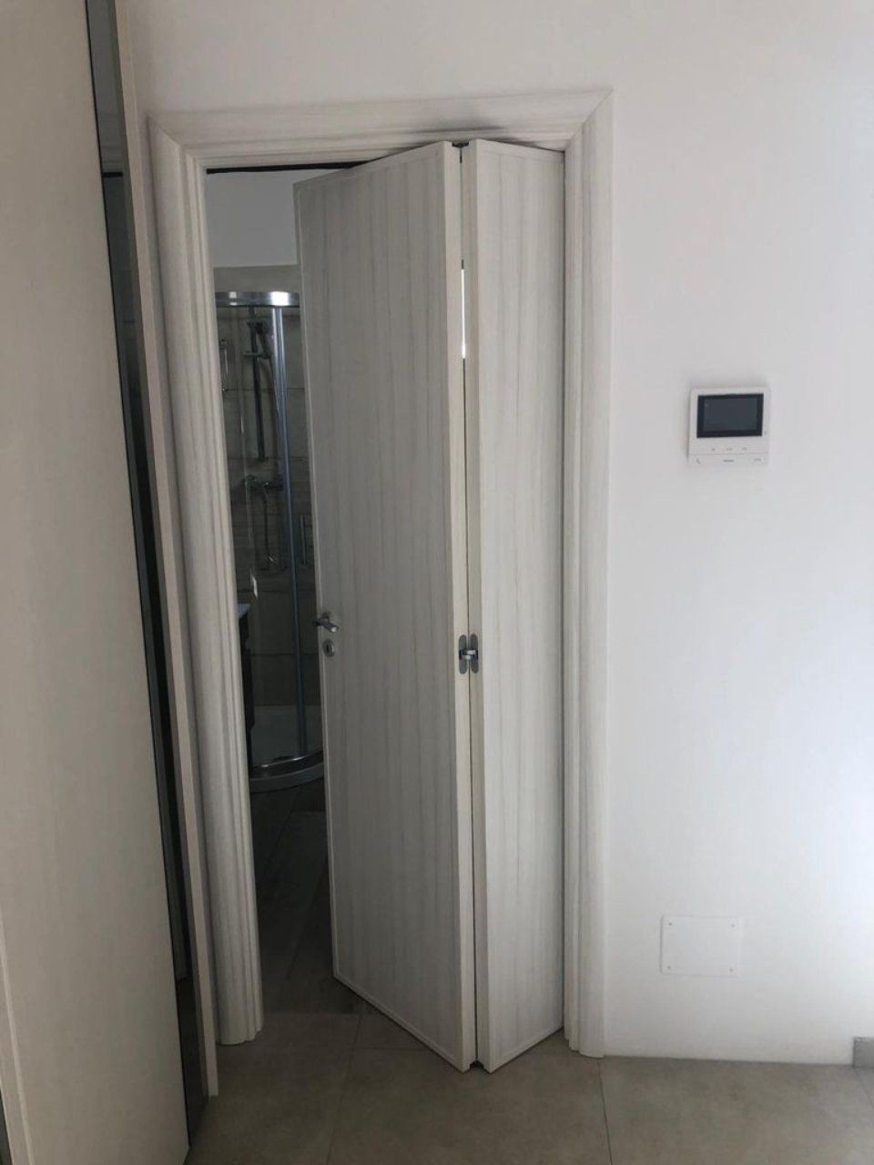 Porta per interni pieghevole