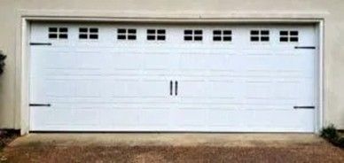 White garage door with top windows.