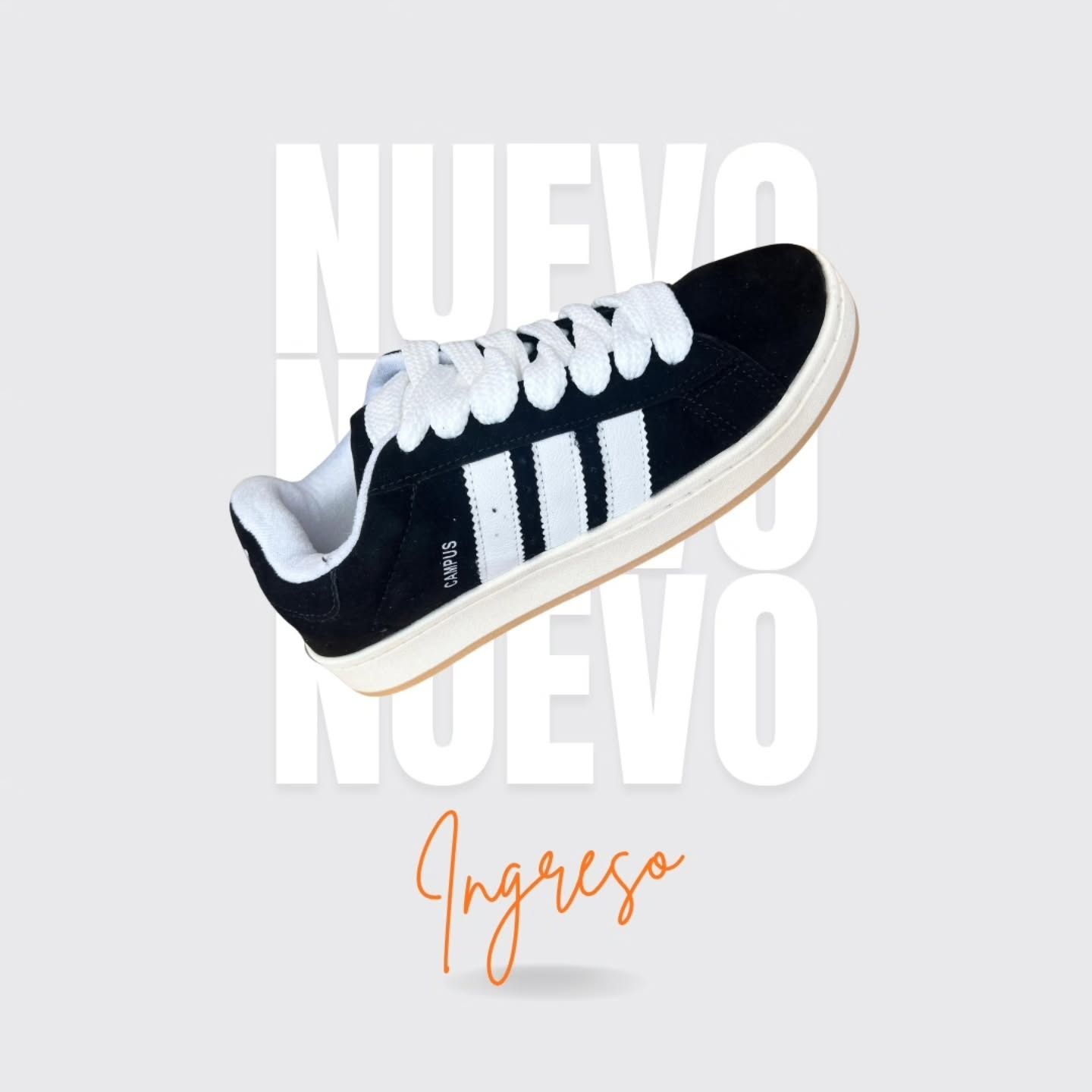 Zapatilla blanca y negra con tres rayas blancas; texto 