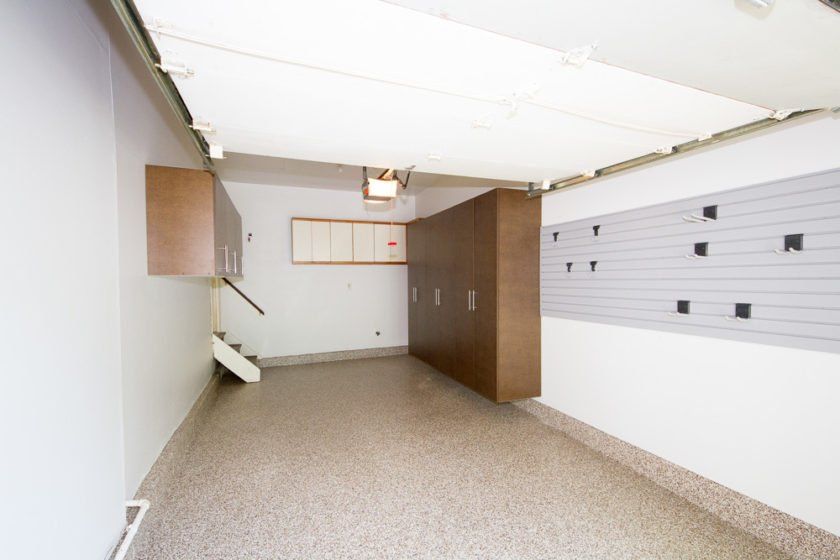One car Madison, NJ garage with beautiful epoxy flooring and Coco cabinets.