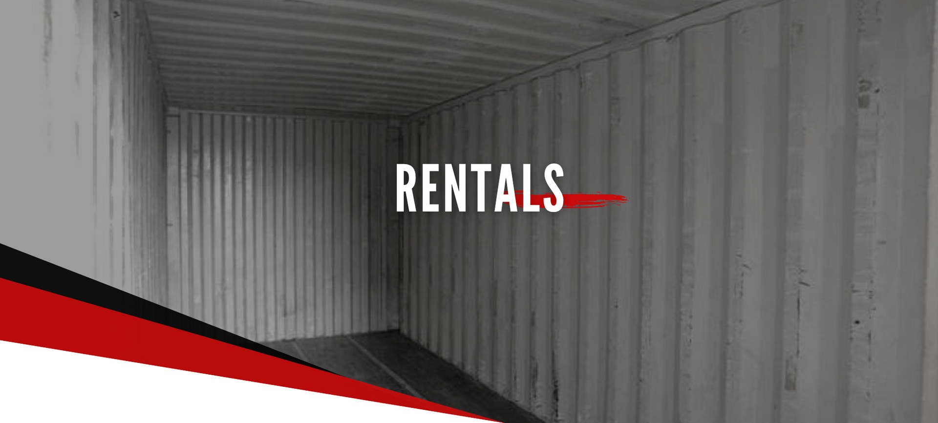 The interior of a corrugated metal shipping container with the word 