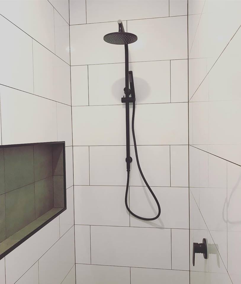 Bathtub in grey bathroom