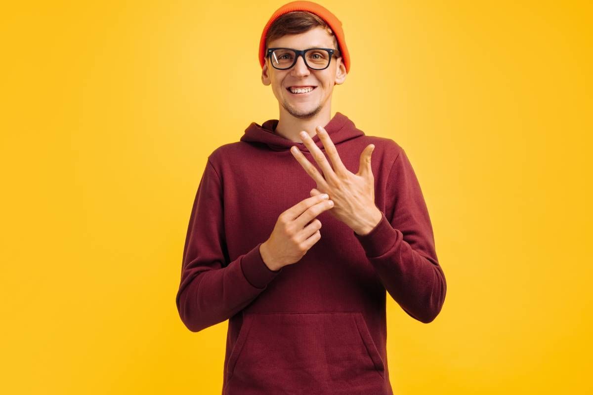 Smiling man wearing glasses with a missing finger at Durrett's Orthotic & Prosthetic Services near Edgewood, KY