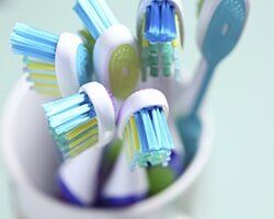 Set of Blue and Green Toothbrush — Dental Care in Denver, CO